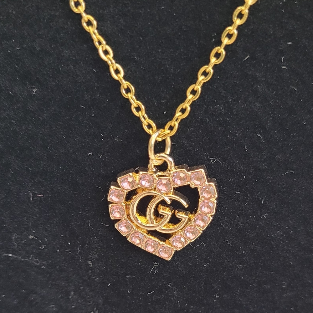 Costume Gucci Zip Pull Gold Tone Heart Pendant Necklace